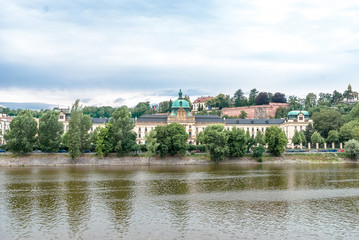 Fototapeta na wymiar Straca Academy from Moldava riverside,Prague, Czech Republic