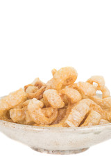 Pork crackling , Fried or roasted pork rind and fat isolated on white background