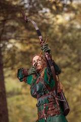 Aiming Elf woman