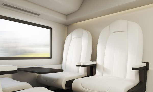 Two white armchairs in compartment