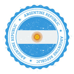 Grunge rubber stamp with Argentina flag. Vintage travel stamp with circular text, stars and national flag inside it. Vector illustration.