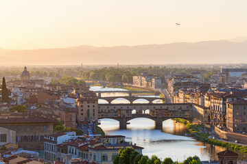 Fototapeta na wymiar View of Florence at sunset with the Ponte Vecchio bridge