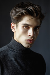 Naklejka premium Portrait of handsome guy with hair.