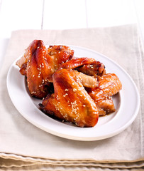 Flying chicken wings with sesame