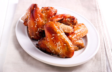 Flying chicken wings with sesame