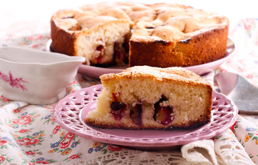 Plum sponge cake slice on plate