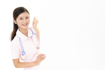 ガッツポーズの看護師