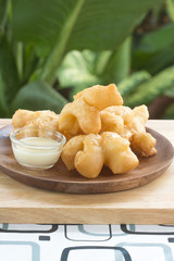 deep fried dough stick  with sweetened condensed milk