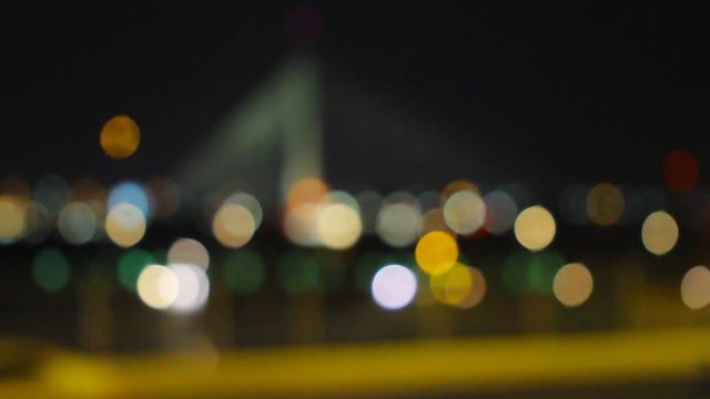 Blurry Ada bridge at night