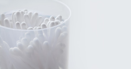 White cotton tipped swabs. Ear sticks close up. Soft focus image. Copy space. macro view