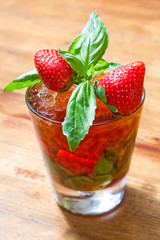 Strawberry cocktail Delizia, soft focus wooden background photo