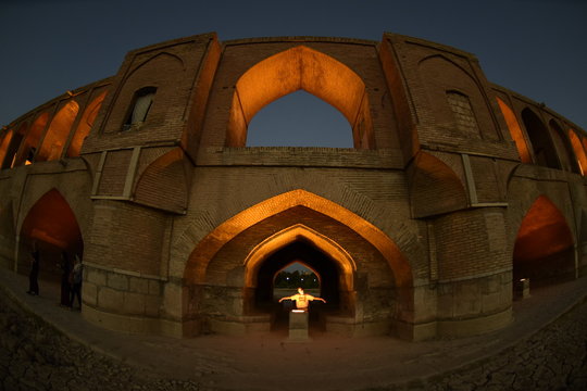 young boy in the Bridge of 33 Arches, Isfahan, Iran.