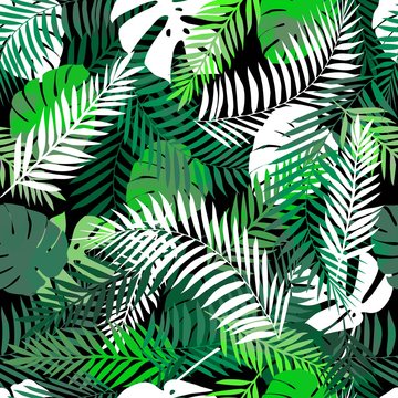 Seamless tropical pattern with palm leaves for fabric design or other uses. Endless exotic background with jungle pattern.