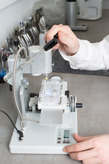 manual work by a optician