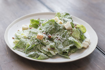 A plated caesar salad.