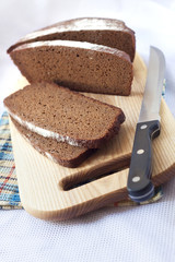 Loaf of wholegrain bread cut on slices