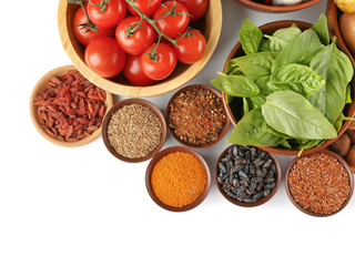 Vegetables and spices on white background