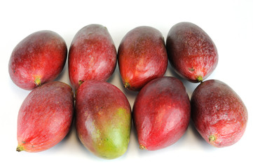 fresh mangoes isolated on white background