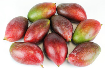 fresh mangoes isolated on white background
