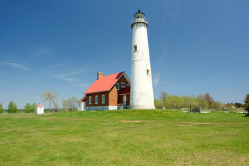 Fototapeta na wymiar Tawas Point Lighthouse, built in 1876