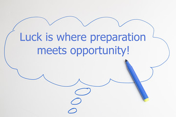 writing Luck is where preparation meets opportunity with blue marker in bubble on white background