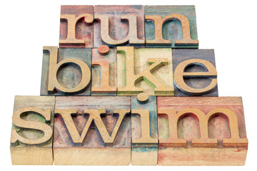 run, bike, swim - triathlon concept