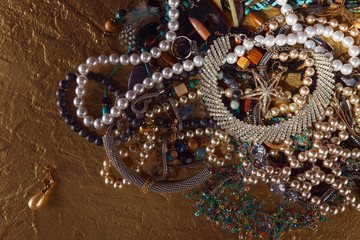 jewelry on a gold background