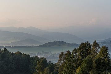 Landscape with fog in mountains