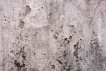 Hintergrund dreckige verputzte Mauer mit Rissen