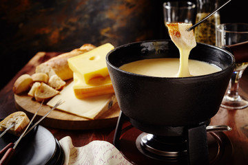 Tasty traditional Swiss cheese fondue - obrazy, fototapety, plakaty