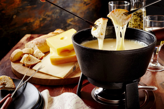 Gourmet Swiss fondue dinner on a winter evening