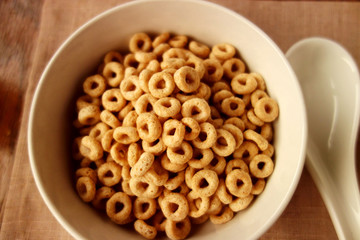 Cheerios - Bowl with cheerios whole grain cereals. 