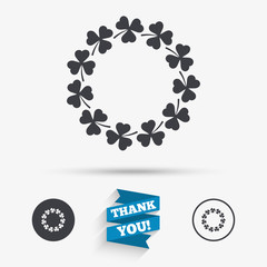 Wreath of clovers with three leaves sign.