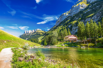Obraz premium Tourquise clear Seealpsee with the Swiss Alps (mountain Santis) in the background, Appenzeller Land, Switzerland