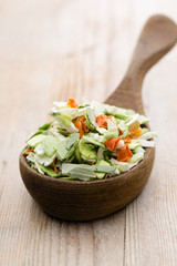 Dried vegetable spice. Bio herbs product. Finely chopped herbs.