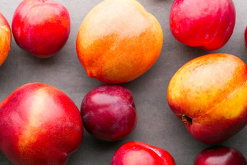 Fresh fruit on the gray background.