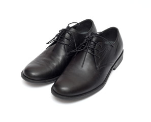 black men's shoes on a white background