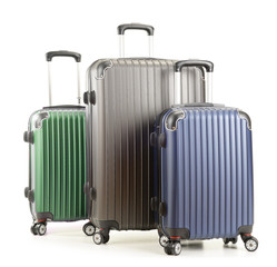 Travel suitcases isolated on white background