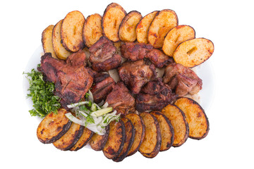 pork and potatoes in pieces grilled top view isolated on the white background