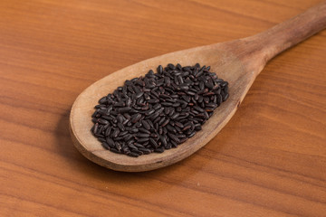 Black Rice into a Spoon