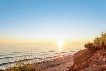 Selbstklebende Fototapete Küste Ozeanküste bei Sonnenaufgang