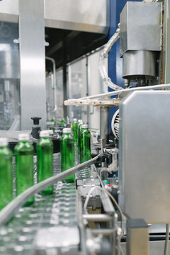 Water factory - Water bottling line for processing and bottling pure spring water into green glass small bottles. 