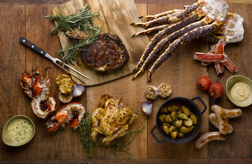 The grill mezza table meal with roasted chicken, beef, lobsters,