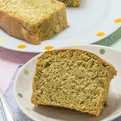 Sliced Egg cake on white platter in the kitchen