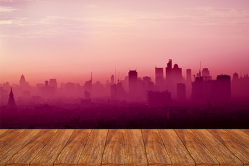 Empty wooden table over cityscape for your product display monta - obrazy, fototapety, plakaty