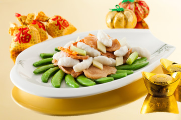 Sensations sauteed mashed cuttlefish with sugar peas fungus