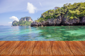 Fototapeta premium Wood table top on blurred beach background - can be used for dis