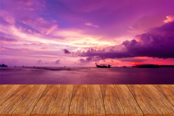 Wood table top on blurred beach background - can be used for dis
