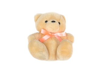 Brown teddy bear with a ribbon on white background