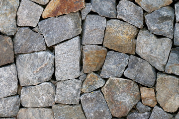 old stone wall Texture in weathered and have natural surfaces.